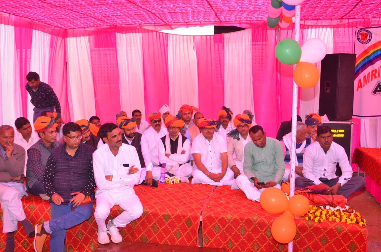 Guests and dignitaries seated at the school celebration