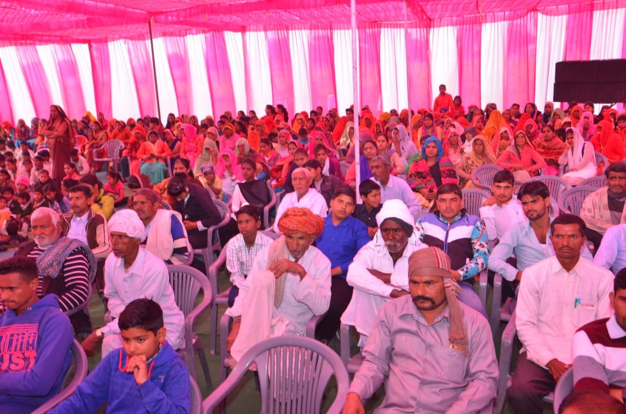 Parents and villagers attending the school function