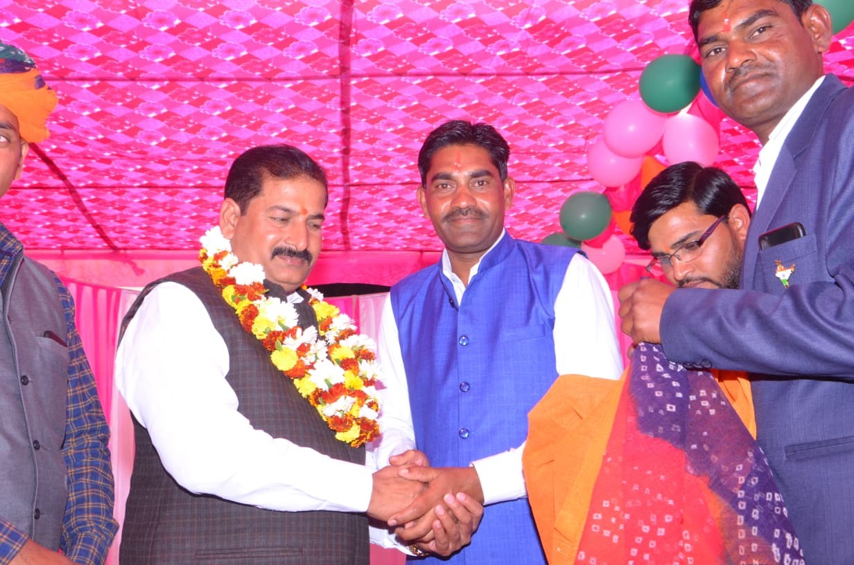 Chief guest being welcomed with a garland at the school function