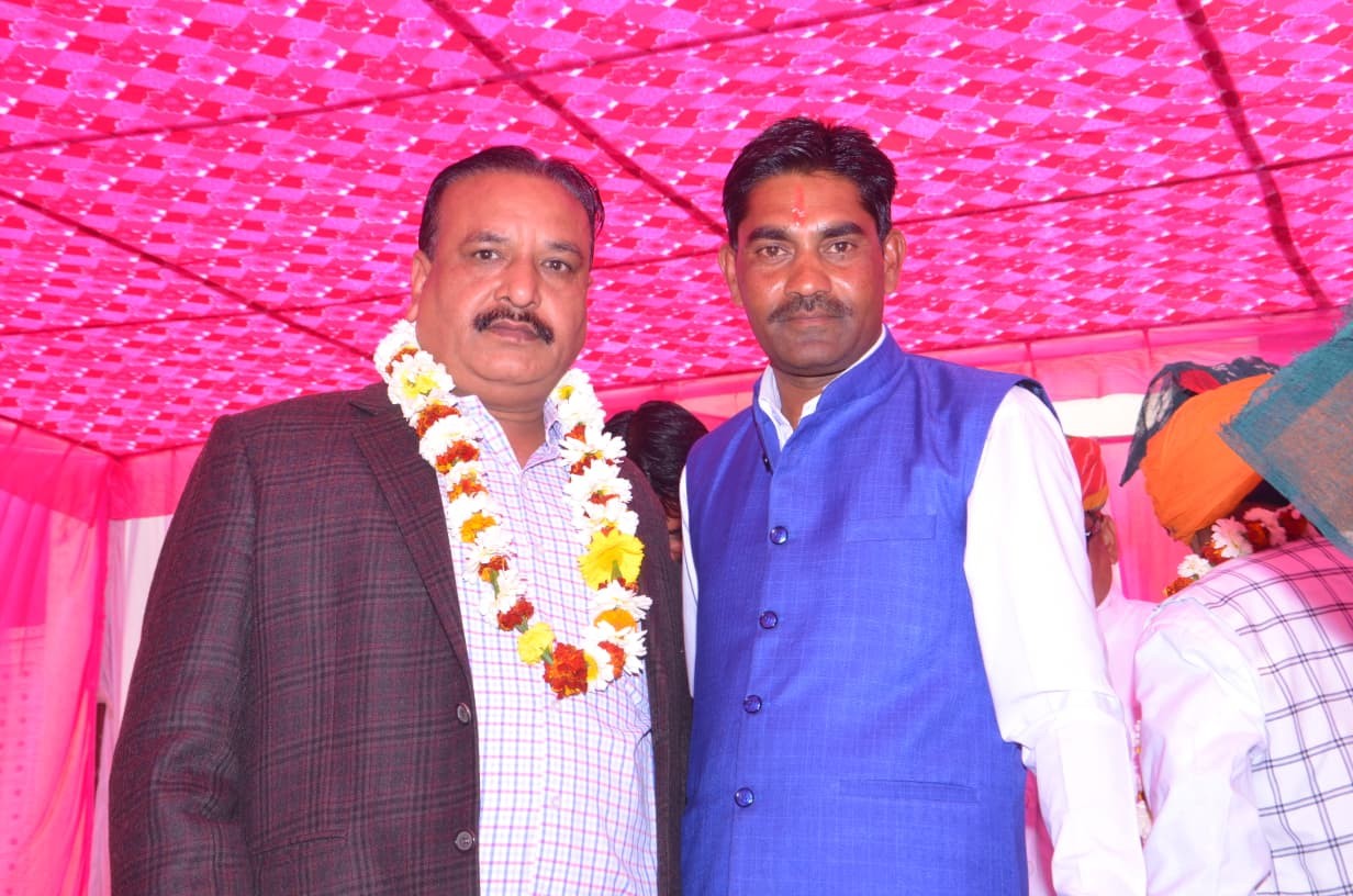 Guests and school management on stage during the annual function